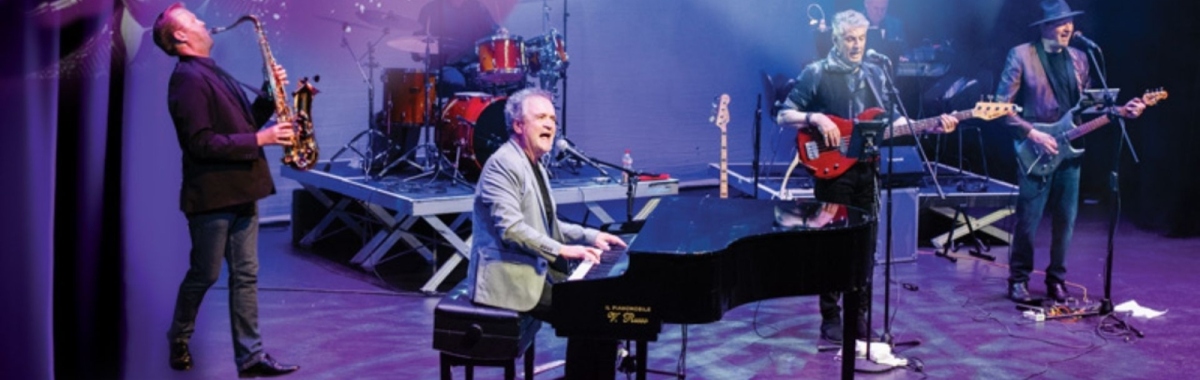 1920x672px The Piano Man e1765881215476 1600x510